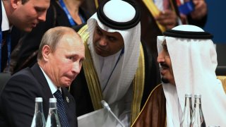 Russia’s President Vladimir Putin with senior Saudi officials in 2014.