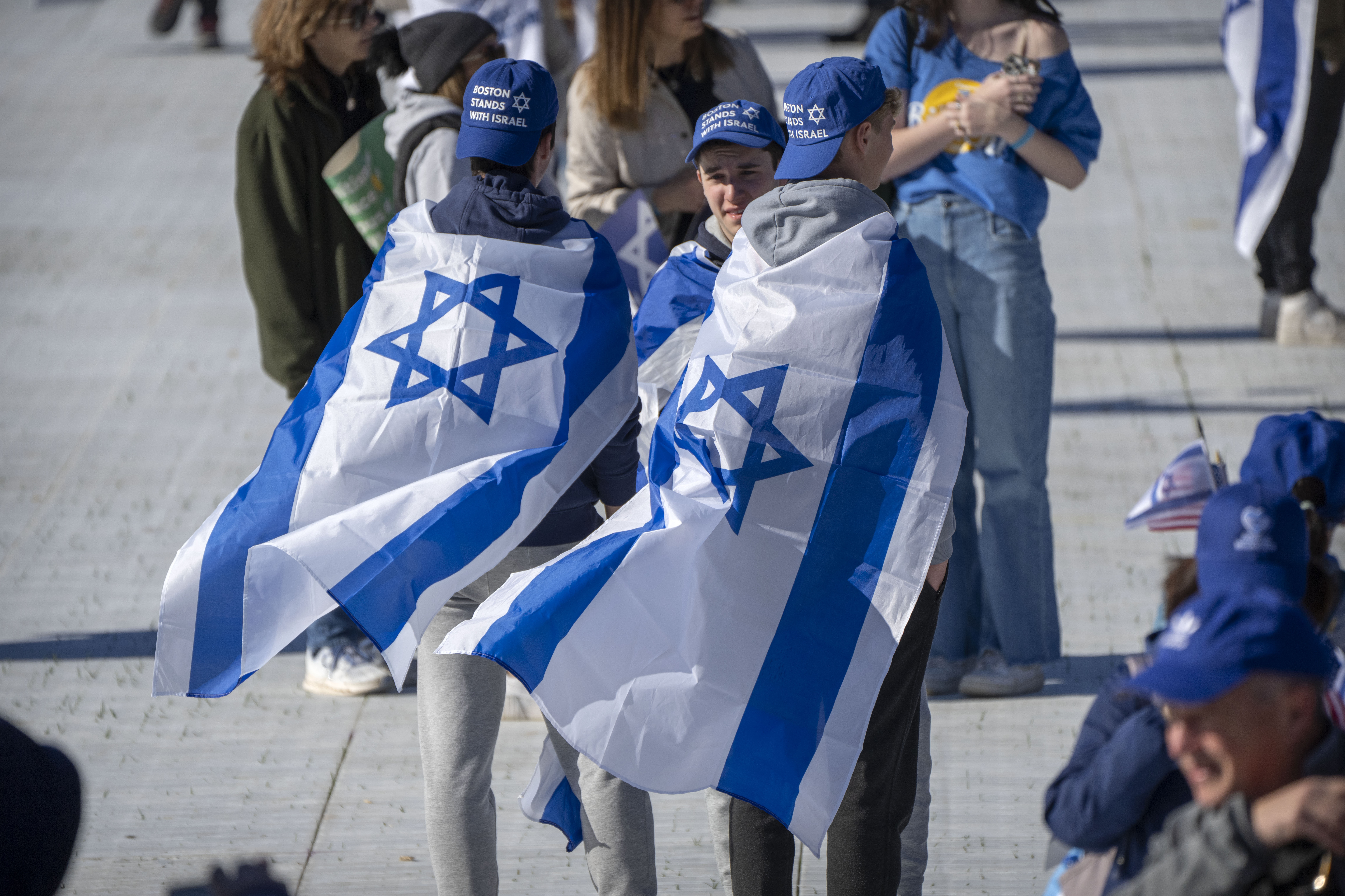 Participants wearing Israeli flags stand on the National Mall at the March for Israel on Tuesday, November 14, 2023 in Washington, DC.