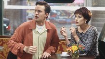 FRIENDS -- "The One with Chandler in a Box" Episode 8 -- Pictured: (l-r) Matthew Perry as Chandler Bing, Paget Brewster as Kathy  (Photo by Paul Drinkwater/NBCU Photo Bank/NBCUniversal via Getty Images via Getty Images)