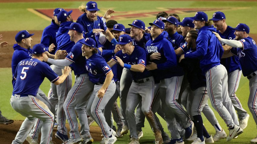 PHOENIX, ARIZONA – NOVEMBER 01: The Texas Rangers celebrate after beating the Arizona Diamondbacks 5-0 in Game Five to win the World Series at Chase Field on November 01, 2023 in Phoenix, Arizona.