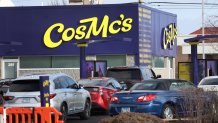 BOLINGBROOK, ILLINOIS - DECEMBER 11: Customers place their orders at CosMc's, a concept restaurant recently launched by McDonald’s on December 11, 2023 in Bolingbrook, Illinois. Lines to order food and beverages at the drive-thru-only restaurant, which opened to the public late last week, have been as long as 6 hours.