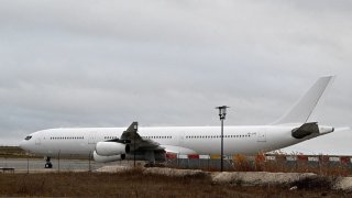 This photograph taken on December 23, 2023, shows the Airbus A340 which was grounded over suspected human trafficking