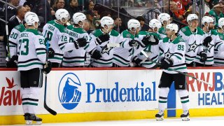 Dallas Stars center Matt Duchene (95) celebrates with teammates after scoring a goal against the New Jersey Devils during the second period of an NHL hockey game Saturday, Jan. 20, 2024, in Newark, N.J.