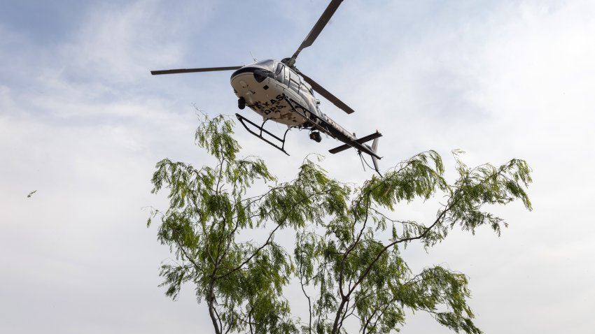 MISSION, TEXAS – MARCH 23:  A Texas Department of Public Safety (DPS) helicopter takes off near the U.S.-Mexico Border on March 23, 2021 near Mission, Texas. A surge of immigrants, including unaccompanied minors crossing into the United States is overcrowded detention centers in south Texas. (Photo by John Moore/Getty Images)