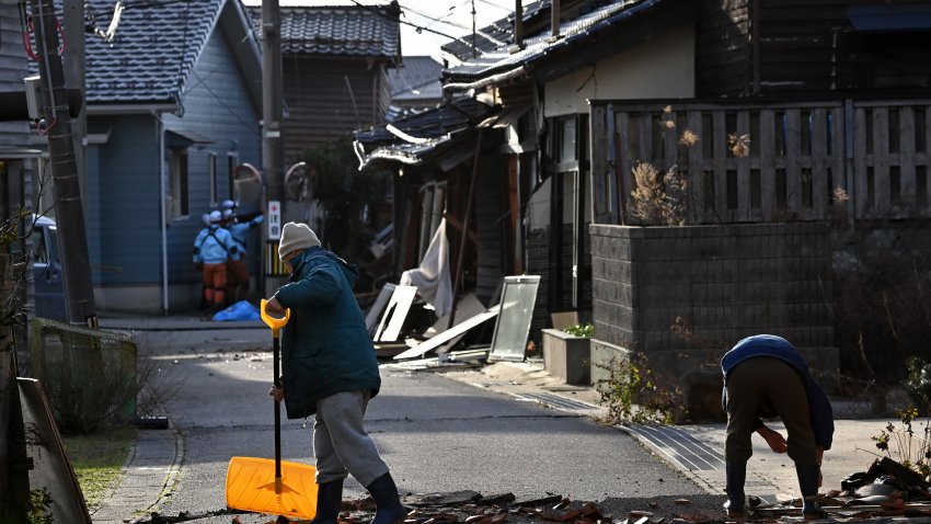 Resident cleans up debris