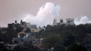 This picture of the Gaza Strip shows smoke billowing over the center of Gaza after Israeli bombardment.