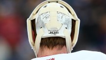 A detailed view of the helmet Montreal Canadiens goalie Mike Condon wore during the 2016 NHL Winter Classic at Gillette Stadium in Foxborough, Massachusetts, on Jan. 1, 2016. The helmet shows New England Patriots coach Bill Belichick and quarterback Tom Brady.