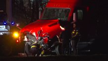 A damaged tractor-trailer is removed from the scene of a wrong-way crash in far North Fort Worth, Thursday, Jan. 25, 2024.