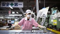 Japan's factory activity contracts most in over three years