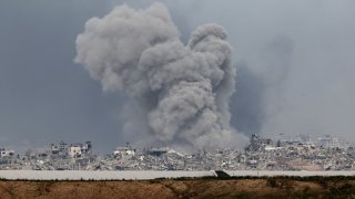 A picture taken from southern Israel near the border with the Gaza Strip on December 21, 2023, shows smoke billowing following Israeli bombardment in the Palestinian territory amid ongoing battles with the Palestinian Hamas militant group.