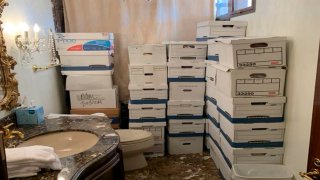 This image, contained in the indictment against former President Donald Trump, shows boxes of records stored in a bathroom and shower in the Lake Room at Trump’s Mar-a-Lago estate in Palm Beach, Fla. (Justice Department via AP)