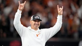 FILE – Texas head coach Steve Sarkisian celebrates after his team won the Big 12 Conference championship NCAA college football game against Oklahoma State in Arlington, Texas, Saturday, Dec. 2, 2023. Sarkisian’s contract extension will push his guaranteed salary to $10.3 million this year under details released by the school’s Board of Regents. That will make him one of the highest paid coaches in the country after leading the Longhorns to the Big 12 championship and their first appearance in the College Football Playoff. (AP Photo/Tony Gutierrez, File)