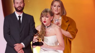 Taylor Swift accepts the Album Of The Year award for “Midnights” on stage with Celine Dion at the 66th Annual GRAMMY Awards held at Crypto.com Arena on February 4, 2024 in Los Angeles, California.