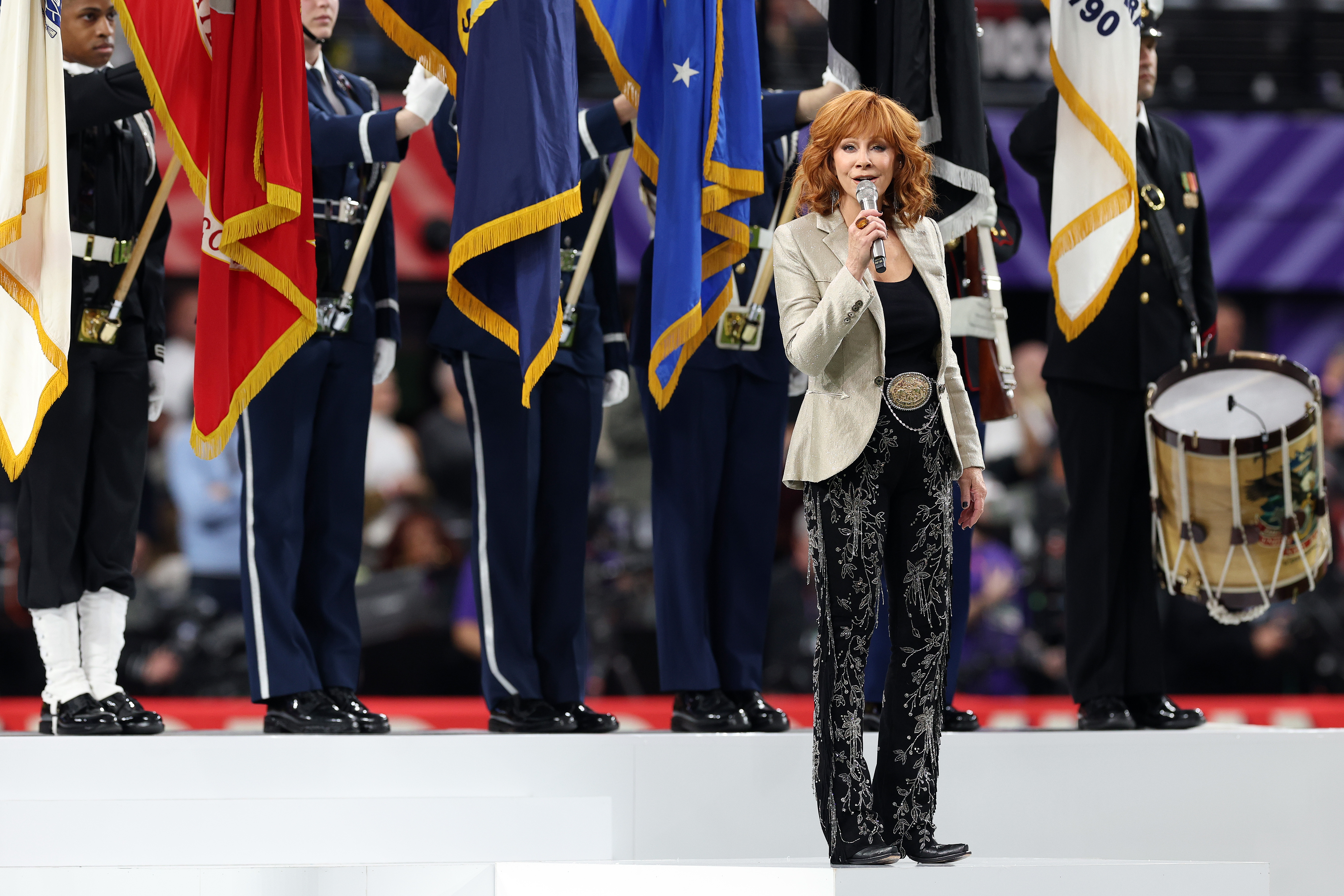 Reba McEntire performs the national anthem prior to Super Bowl LVIII between the San Francisco 49ers and Kansas City Chiefs at Allegiant Stadium on February 11, 2024 in Las Vegas, Nevada.<br><em>(Photo by Jamie Squire/Getty Images)</em>