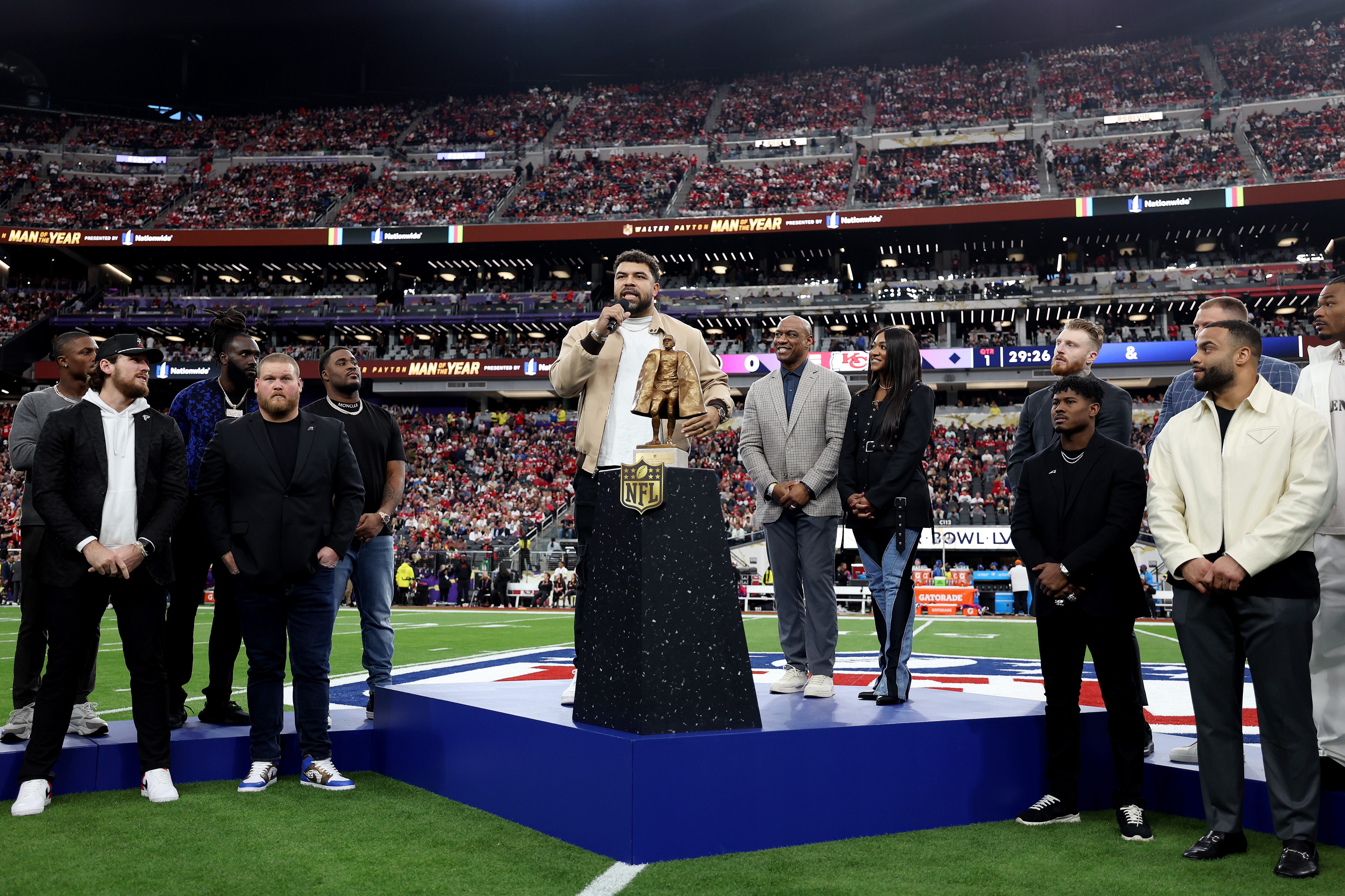 Cam Heyward of the Pittsburgh Steelers receives the NFL Walter Payton Man of the Year award prior to Super Bowl LVIII between the San Francisco 49ers and Kansas City Chiefs at Allegiant Stadium on February 11, 2024 in Las Vegas, Nevada.<br><em>(Photo by Jamie Squire/Getty Images)</em>