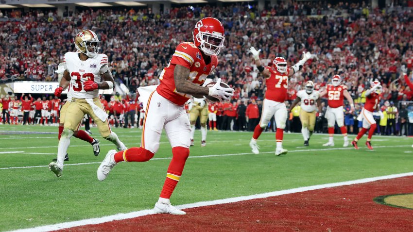 Mecole Hardman Jr. of the Kansas City Chiefs celebrates after catching the game-winning touchdown in overtime to defeat the San Francisco 49ers 25-22 during Super Bowl LVIII at Allegiant Stadium on Feb. 11, 2024 in Las Vegas, Nevada.