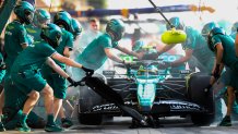 BAHRAIN, BAHRAIN - FEBRUARY 23: Fernando Alonso of Spain driving the (14) Aston Martin AMR24 Mercedes makes a pitstop during day three of F1 Testing at Bahrain International Circuit on February 23, 2024 in Bahrain, Bahrain. (Photo by Peter Fox - Formula 1/Formula 1 via Getty Images)