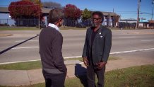 Arthur Fleming, right, talks with NBC 5 Senior Investigative Producer Scott Friedman, left, about the dangers pedestrians face along Loop 12.