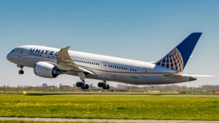 A United Airlines Boeing 787-8 Dreamliner aircraft is seen taking off from Amsterdam Schiphol Airport.