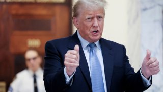 Former U.S. President Donald Trump delivers remarks after exiting the courtroom as he attends his Manhattan courthouse trial in a civil fraud case in New York, October 18, 2023.
