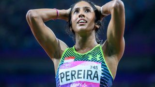 Singapore’s Shanti Pereira of Singapore celebrates winning the women’s 200m final athletics event during the 19th Asian Games at Hangzhou Olympic Sports Centre on Oct. 2, 2023.