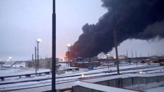 Smoke billows after Ukraine’s SBU drone strikes a refinery, amid Russia’s attack on Ukraine, in Ryazan, Ryazan Region, Russia, in this screen grab from a video obtained by Reuters, March 13, 2024. 
