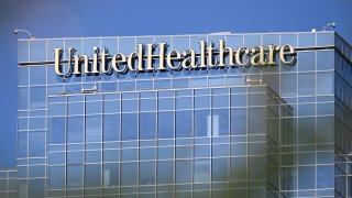 UnitedHealthcare (UHC) health insurance company signage is displayed on an office building in Phoenix, Arizona on July 19, 2023. 