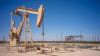 Oil prices slip on U.S. crude stockpile increase