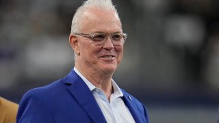 FILE – Dallas Cowboys chief operating officer/executive vice president/player personnel Stephen Jones smiles before an NFL football game against the Washington Commanders, Nov. 23, 2023, in Arlington, Texas. Jones is steadfast in communicating the organization’s belief in avoiding big-money deals for free agents, regardless of where the team is with the salary cap.