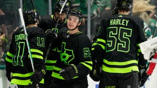 Dallas Stars’ Wyatt Johnston (53), Logan Stankoven (11), Thomas Harley (55) and Jamie Benn, center rear, celebrate Johnston’s goal in the first period of an NHL hockey game against the New Jersey Devils in Dallas, Thursday, March 14, 2024.