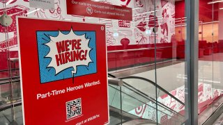 We’re Hiring, Part-time heroes wanted, sign at entrance to Target Store, Queens, New York.