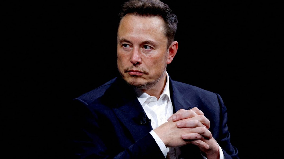 Musk makes surprise visit to Beijing as Tesla's China-made cars pass data security rules - Vimarsana News