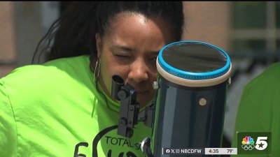 Schoolchildren scream with excitement as clouds clear just in time for solar eclipse