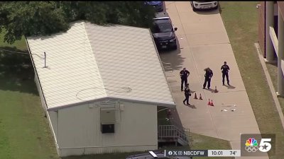 One student killed, another in custody after school shooting