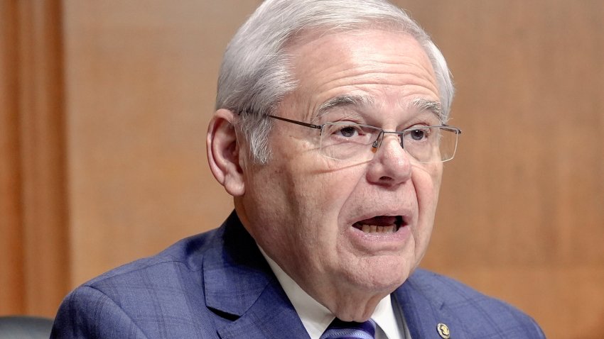 FILE – U.S. Sen. Bob Menendez, D-N.J., asks a question during a Senate Finance Committee hearing on Capitol Hill, Thursday, March 14, 2024, in Washington. Menendez said Thursday, March 21, 2024, that he will not run in the Democratic primary as he faces federal corruption charges, but he left open the possibility that he would reenter the race as an independent later in the year if he is exonerated at trial.