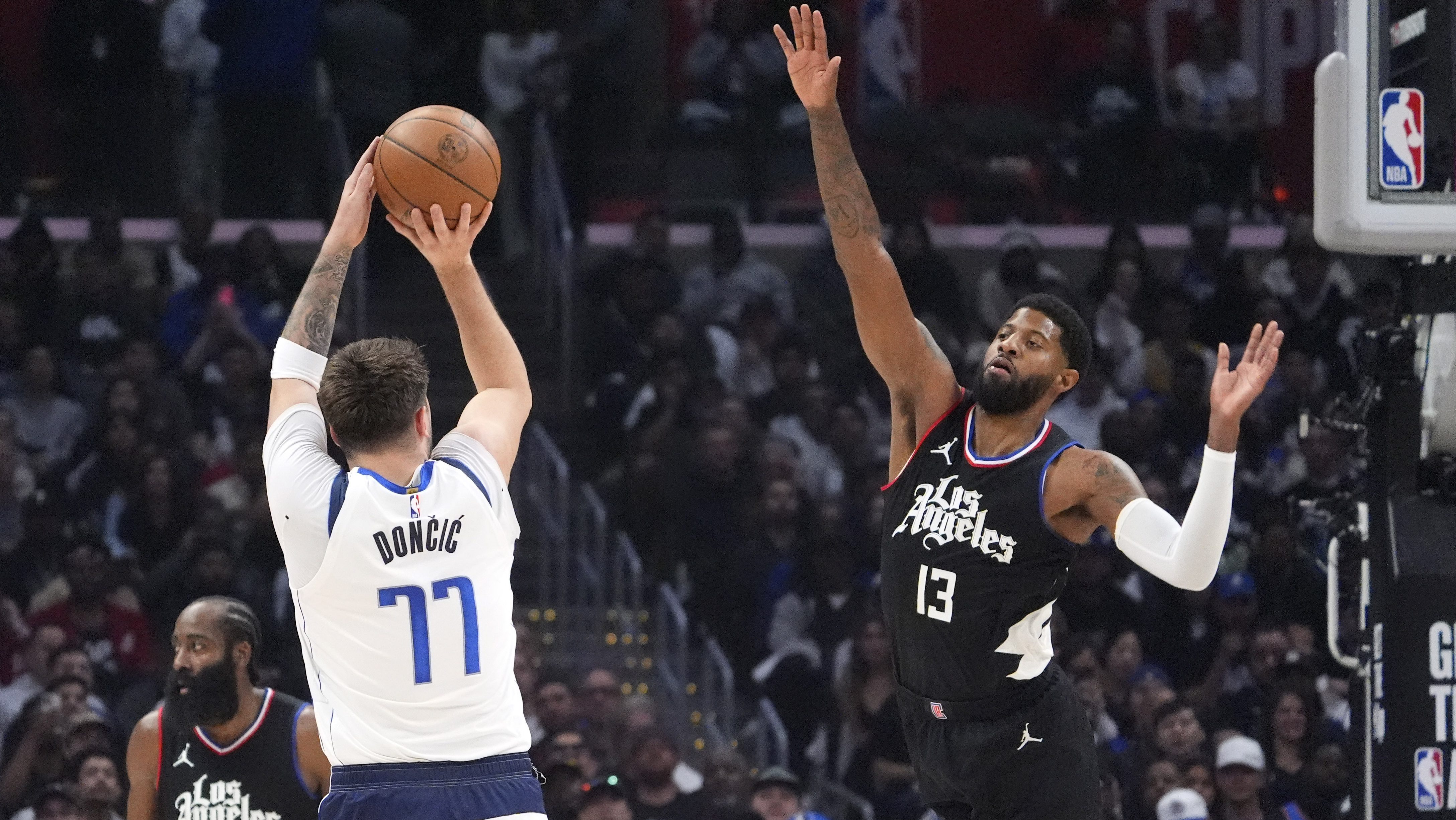Luka Doncic and Kyrie Irving lead Mavs over Clippers 96-93 to tie
series as Kawhi Leonard returns