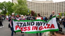 Demonstrators protest the Israel-Hamas war outside the Washington Hilton hotel before the start of the White House Correspondents' Association Dinner