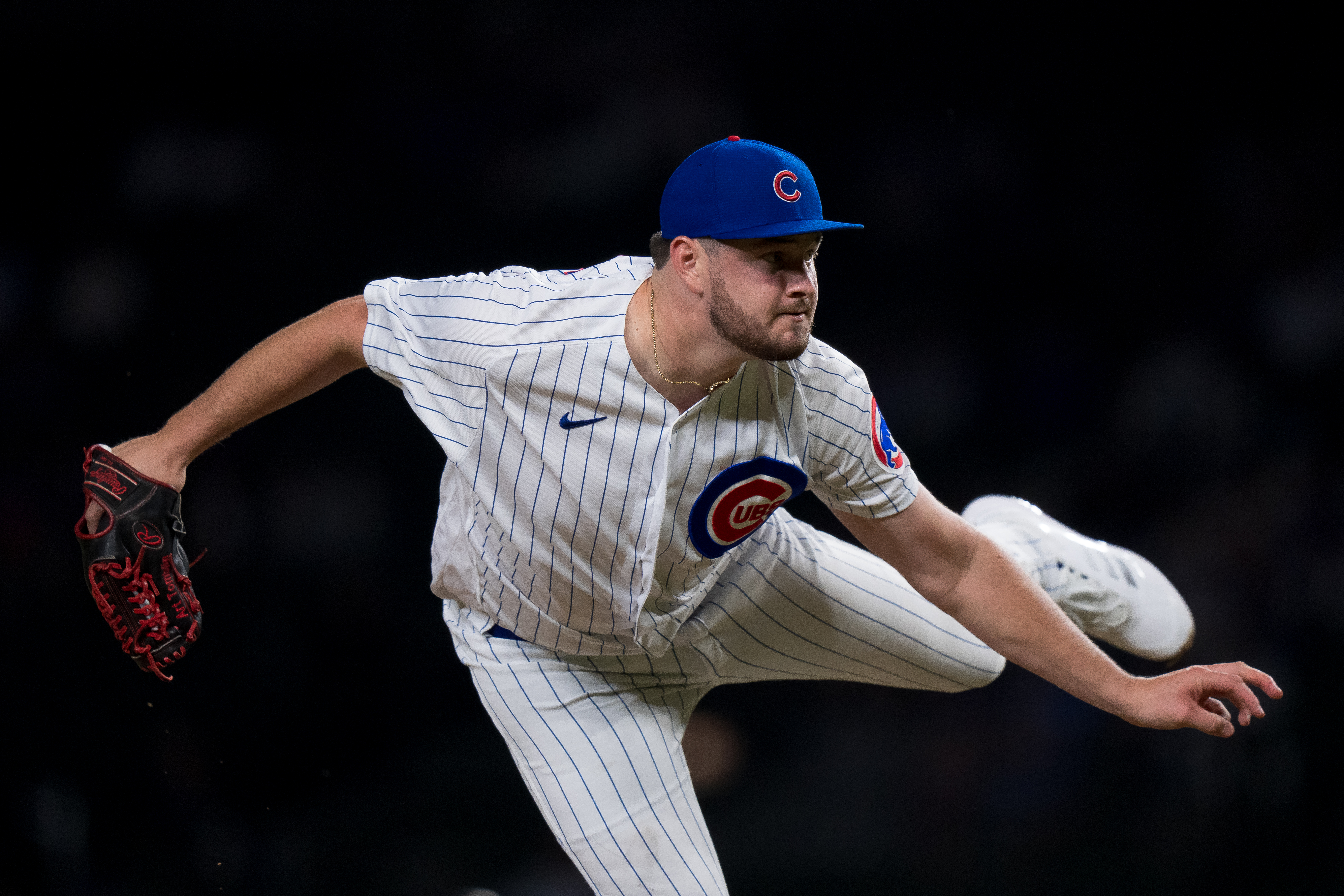 Cubs reliever Luke Little forced to change his glove because of white
in American flag patch