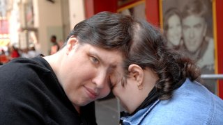 Lori and George Schappell, the world's oldest female conjoined twins, attend the opening celebration of the new Ripley's Believe It or Not