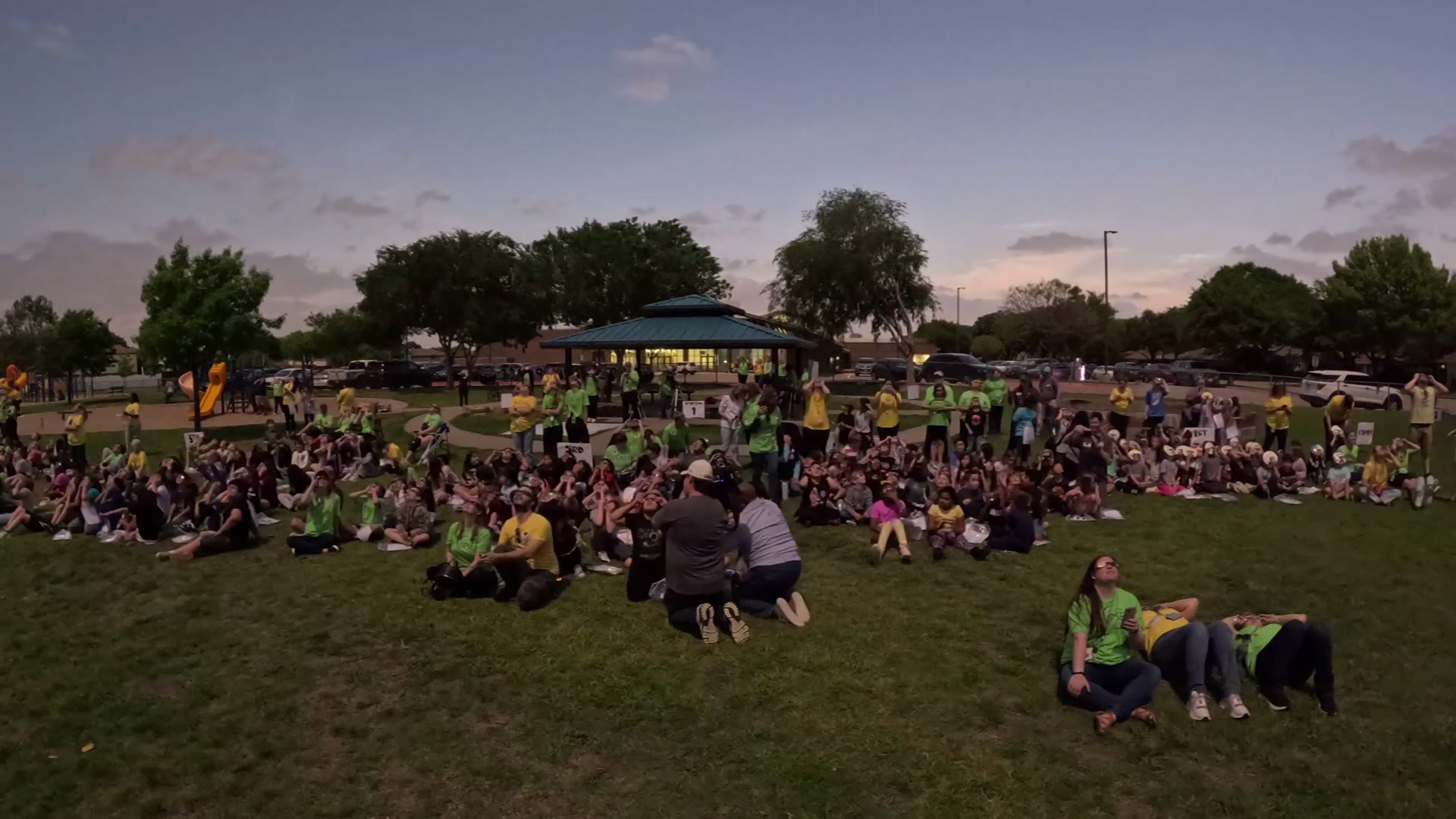 Students scream with joy as crystal clear view of eclipse opens up