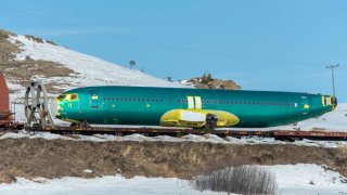 Boeing 737 Max 8 fuselages manufactured by Spirit Aerosystems in Wichita, Kansas are transported on a BSNF train heading west over the Bozeman Pass March 12, 2019 in Bozeman, Montana. 