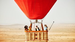 A hot air balloon ride over the deserts of Morocco.