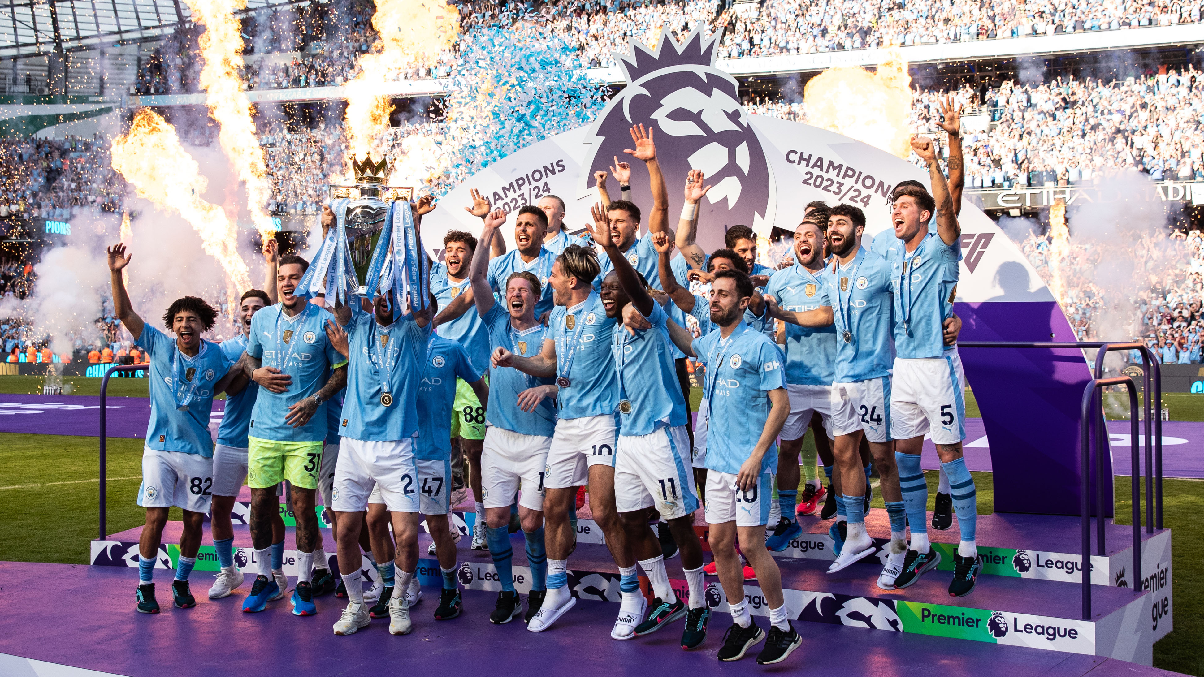 Man City wins record fourth-straight Premier League title after 3-1
win over West Ham