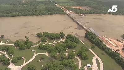 Flooding in Johnson County spills water over roadways