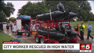 Dallas firefighters rescue city worker stuck in high water