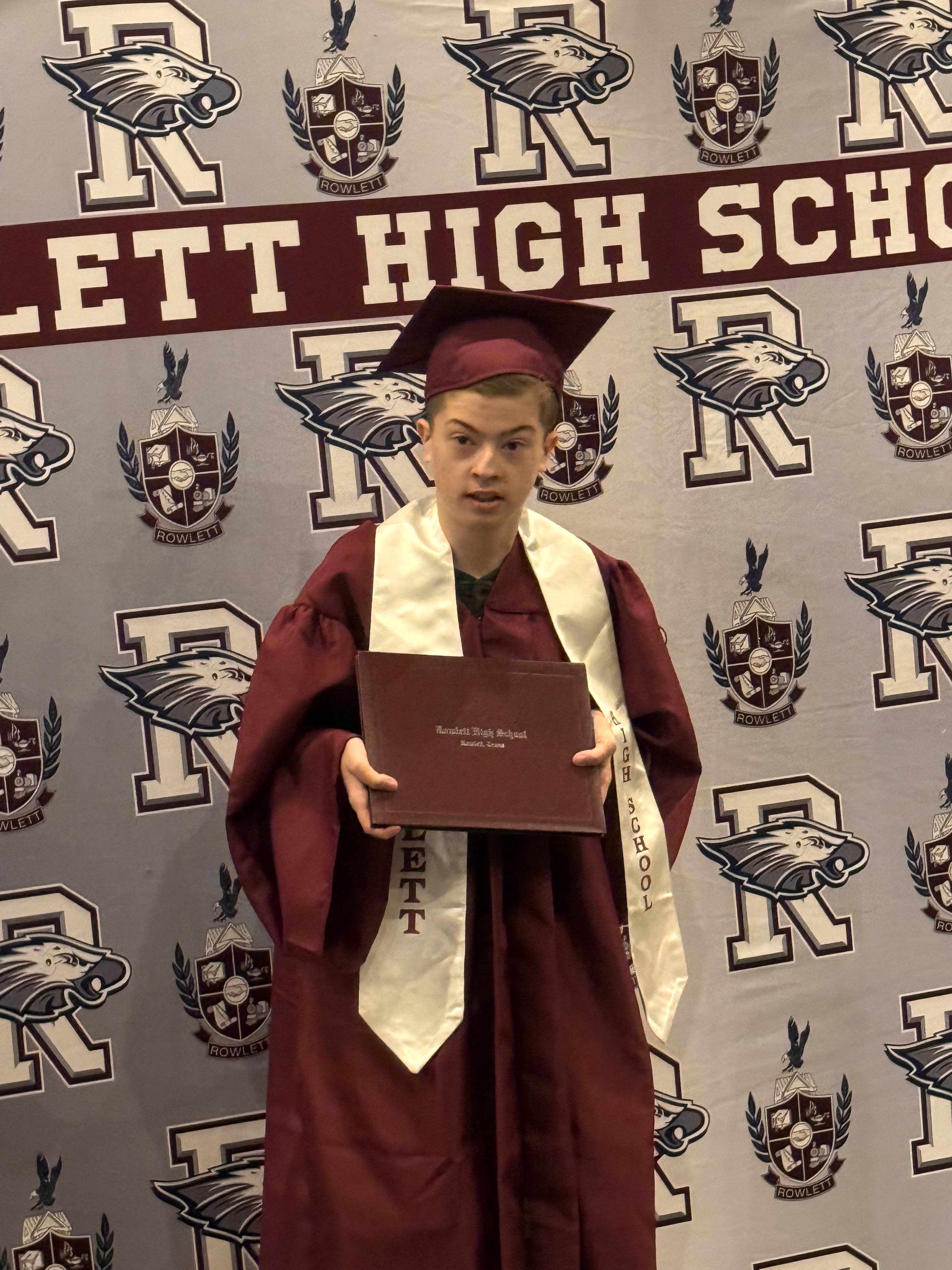 This is my son Noah Skowron. He graduated from Rowlett High School.
Noah has special needs. He has autism, a seizure disorder (Lennox Gastaut Syndrome) and a feeding tube. Noah has matured so much in the last few years. We are so proud of him! He will move on to a transition program next year where he will learn valuable skills in order to be more independent in his daily life.