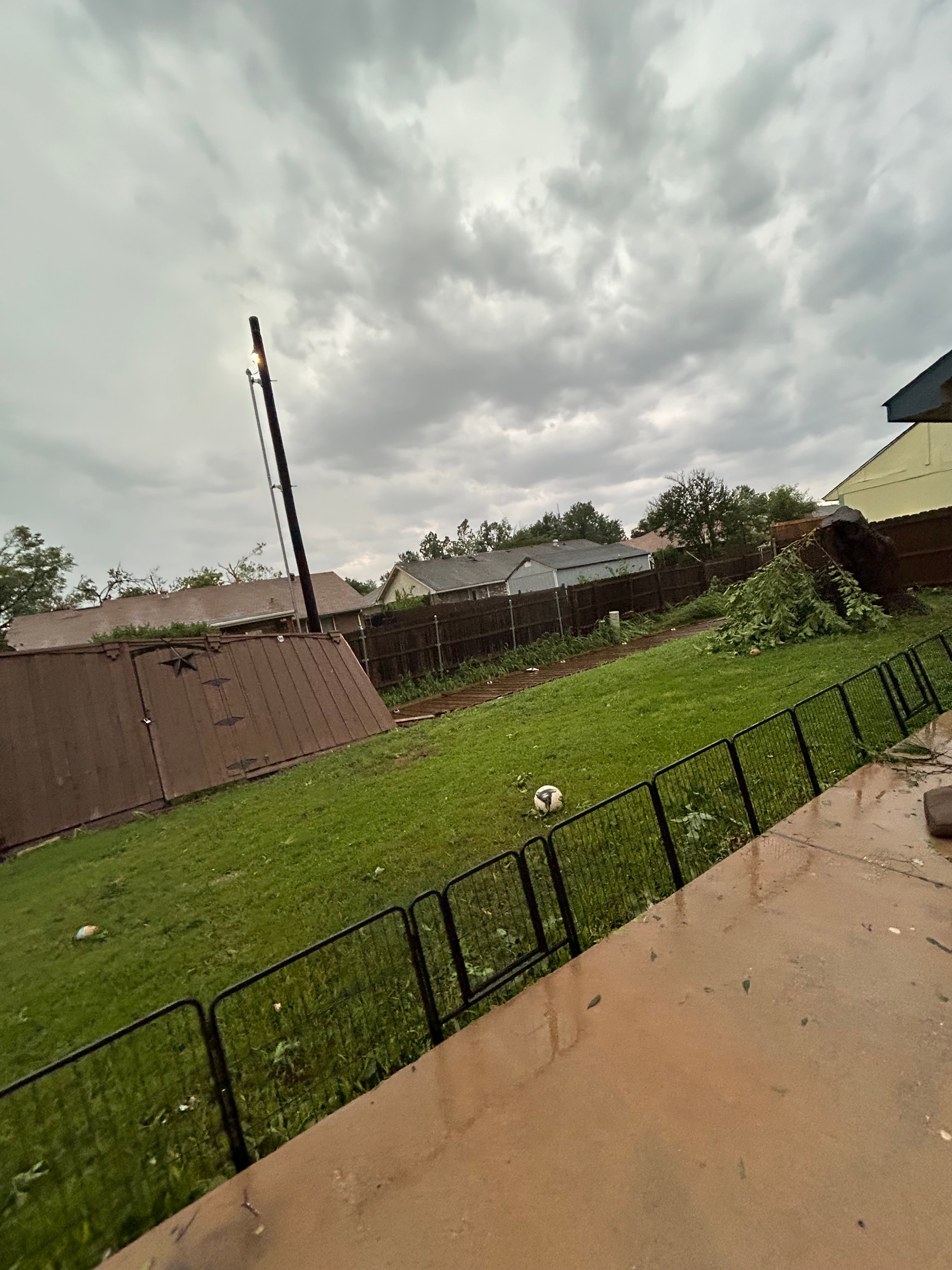 Backyard fence down within minutes!
