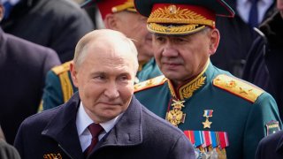 FILE - Russian President Vladimir Putin, left, and Russian Defense Minister Sergei Shoigu leave Red Square after the Victory Day military parade