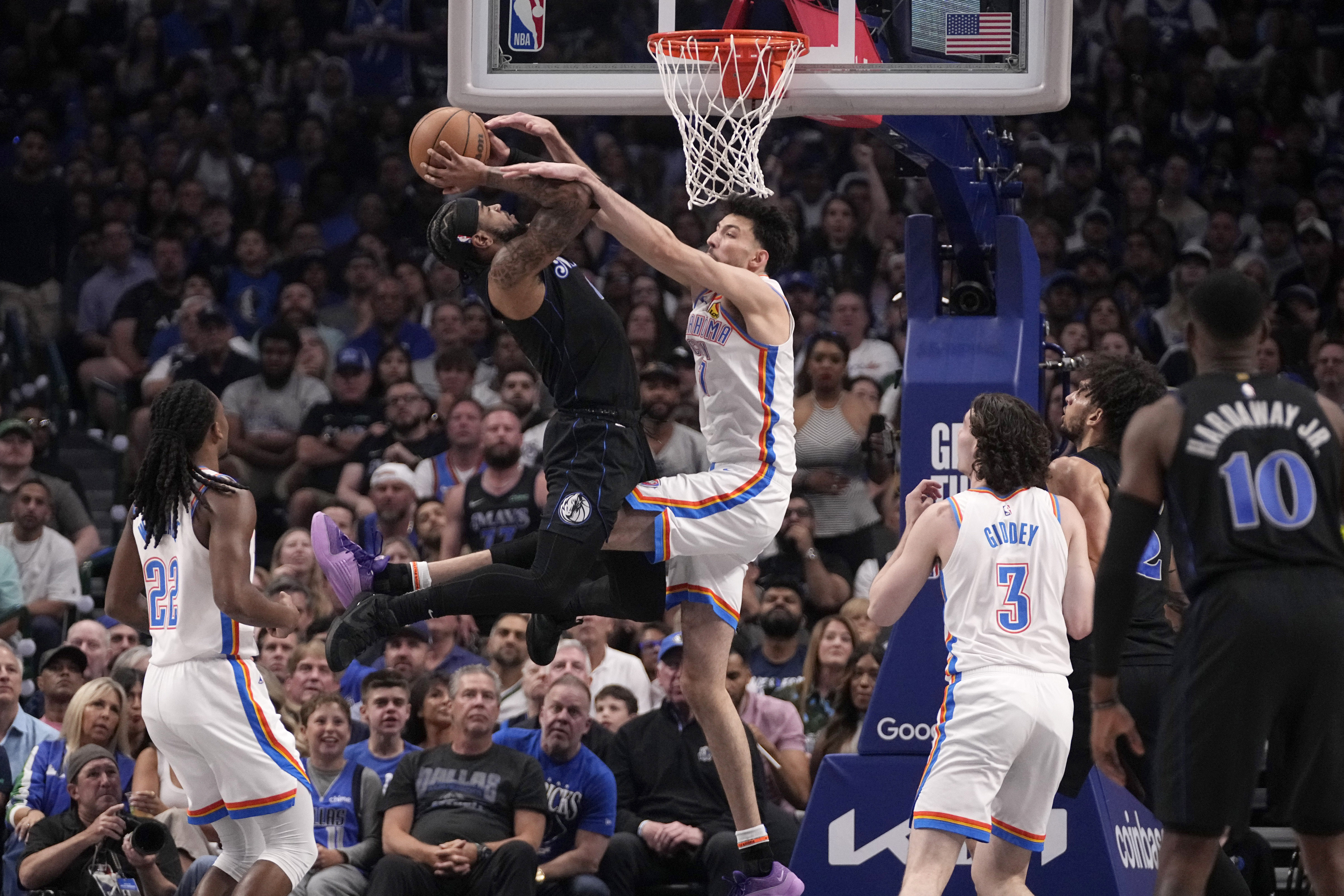 P.J. Washington's free throws finish rally as Mavs beat Thunder to
reach West finals