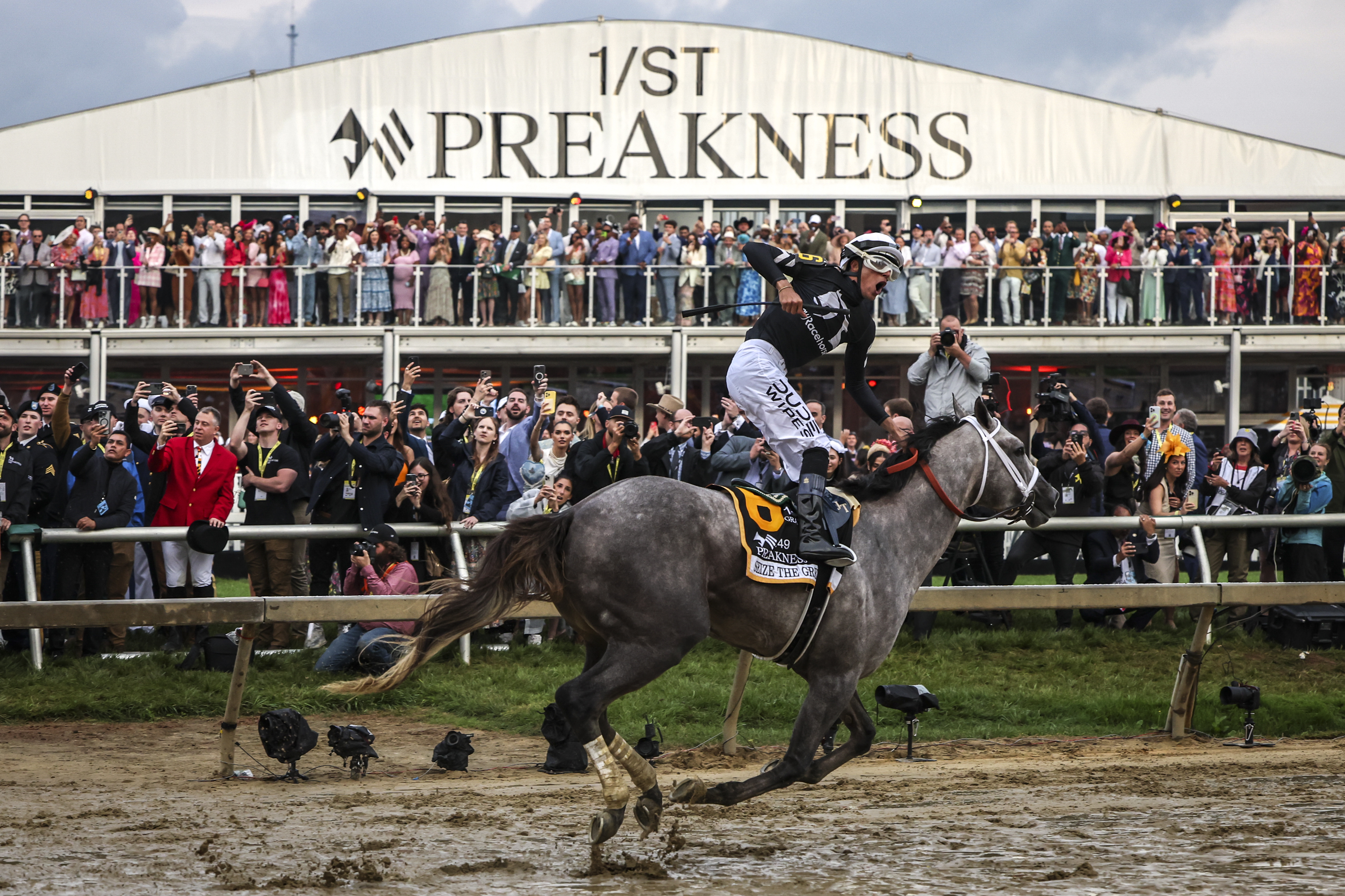 Seize the Grey wins 149th Preakness Stakes in a muddy and thrilling
race